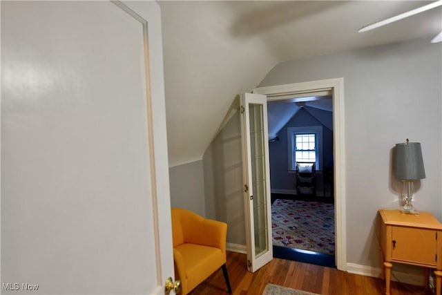 bonus room featuring wood-type flooring and lofted ceiling