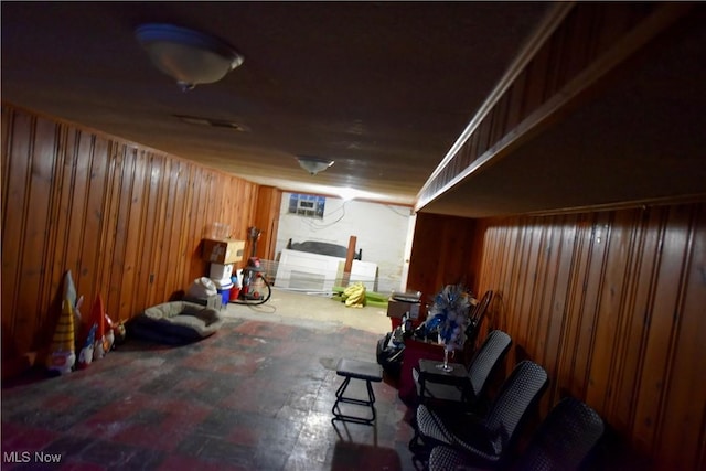 basement with wooden walls