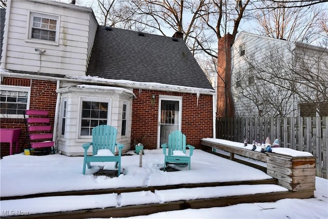 view of snow covered property