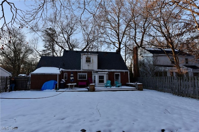 view of snow covered property