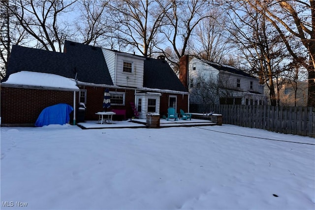 view of snow covered property