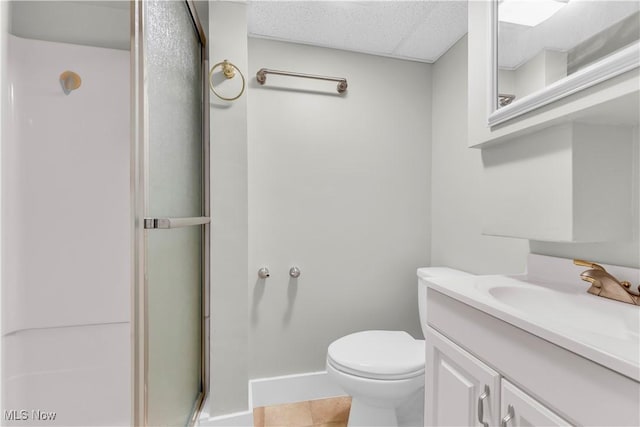 bathroom with a shower with door, toilet, tile patterned floors, and vanity