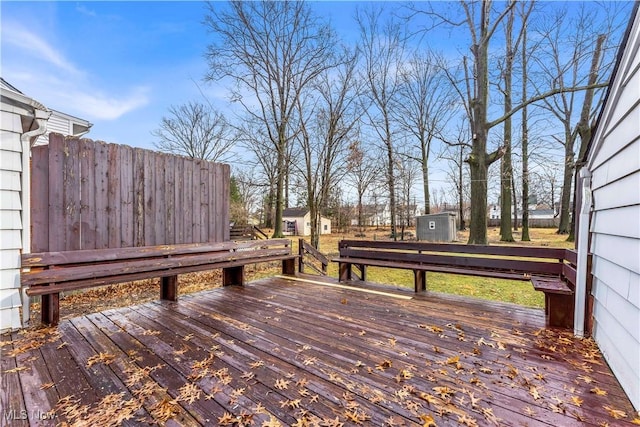 deck with a storage shed