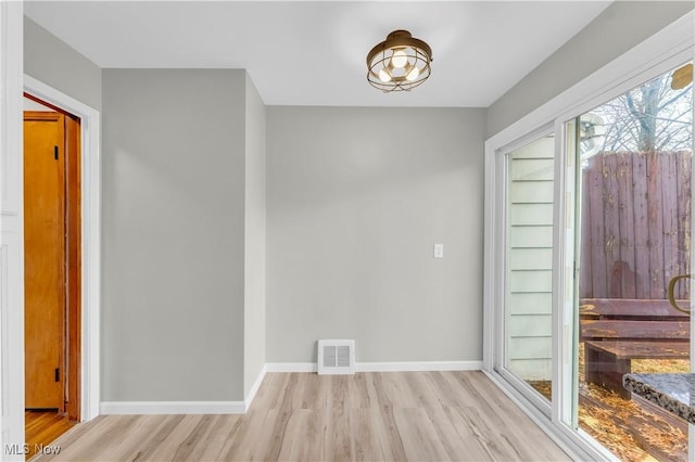 entrance foyer with light hardwood / wood-style floors