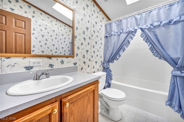 full bathroom with toilet, crown molding, shower / bath combo with shower curtain, vanity, and vaulted ceiling