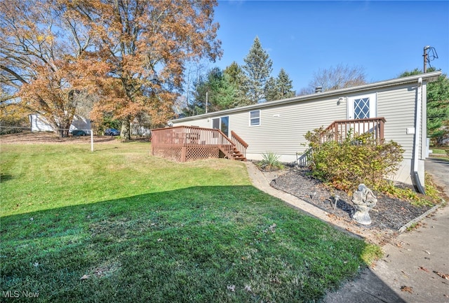 view of yard with a deck