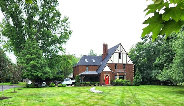 tudor house with a front yard