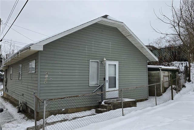 view of snow covered property