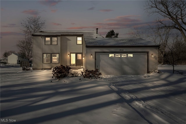 view of front of house with a garage