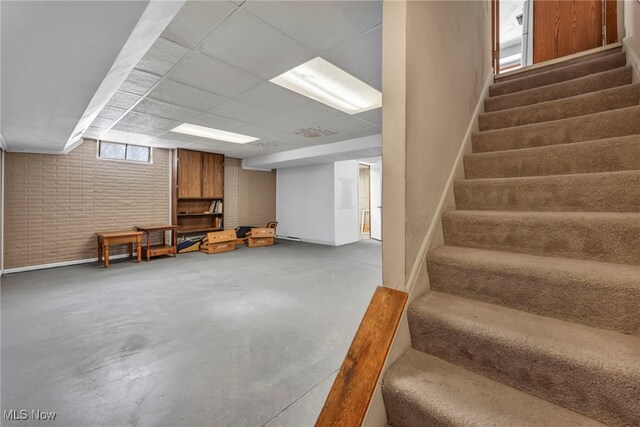 basement with a drop ceiling