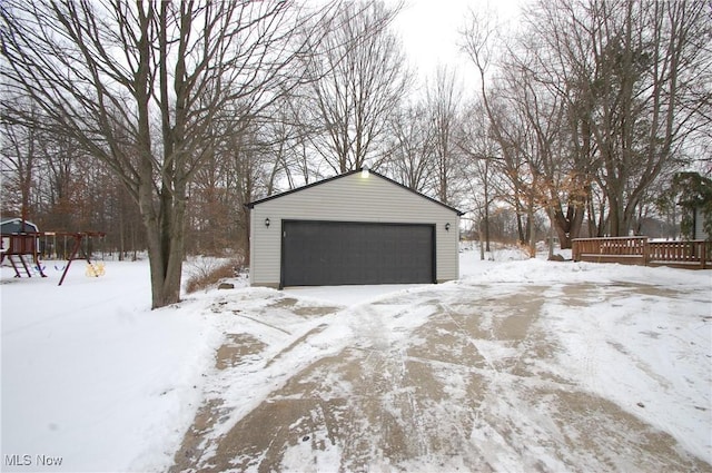 view of snow covered garage