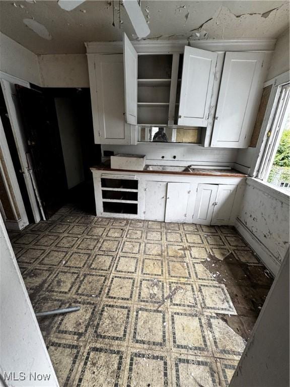 kitchen with white cabinets