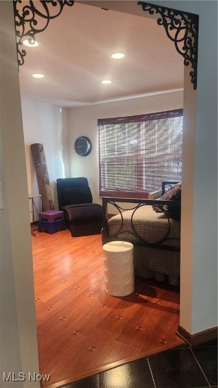 sitting room featuring wood-type flooring