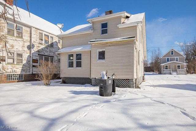 view of snow covered property