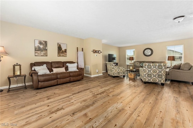 living room featuring light wood-type flooring