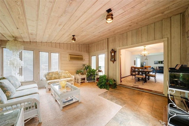 living room featuring wooden ceiling, plenty of natural light, and wooden walls