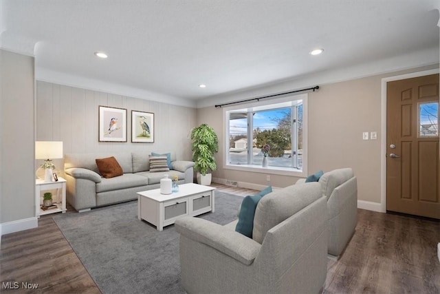 living room with dark hardwood / wood-style floors