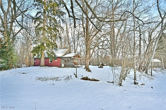 view of yard covered in snow