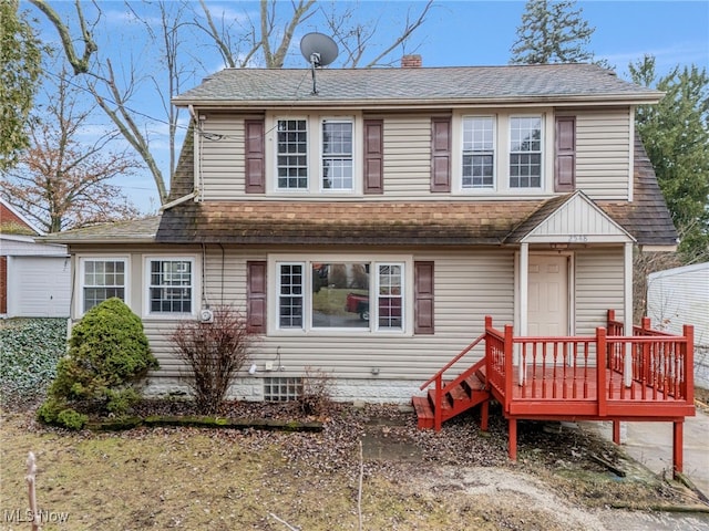 view of front of house with a wooden deck