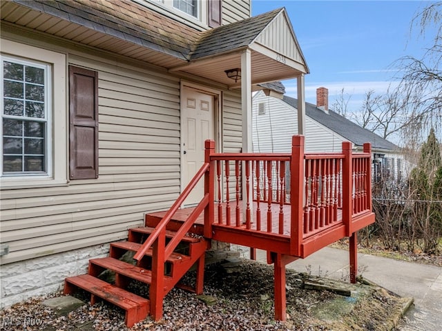 doorway to property with a wooden deck