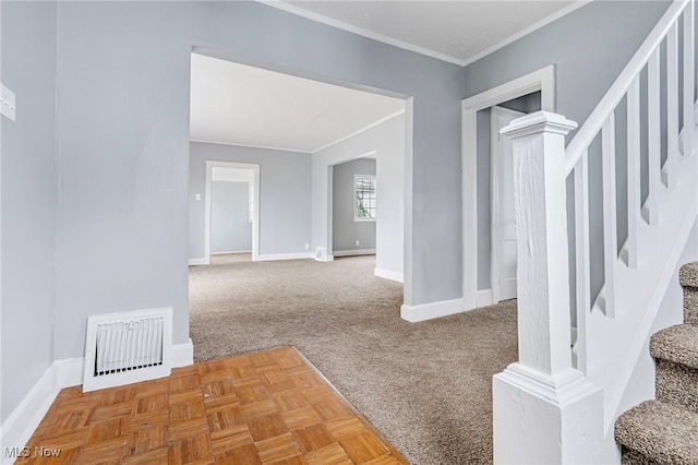 hall with carpet and crown molding