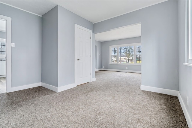 unfurnished room featuring carpet floors