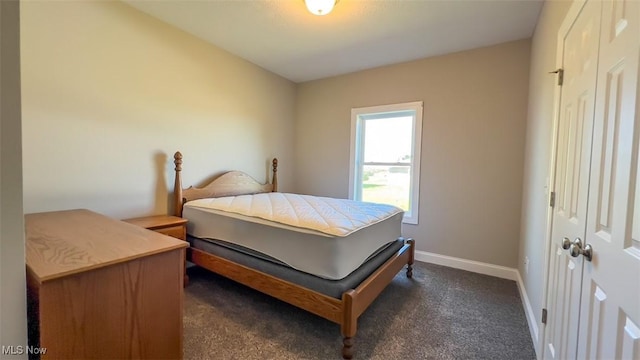 carpeted bedroom with a closet