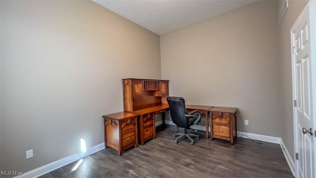 office space with dark wood-type flooring