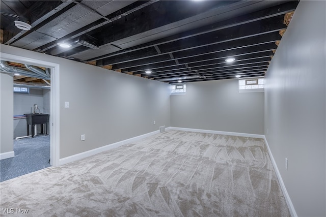 basement with carpet flooring