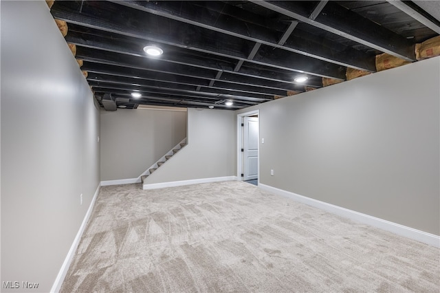 basement with light carpet