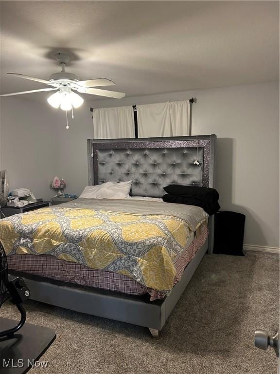 bedroom featuring ceiling fan and carpet floors