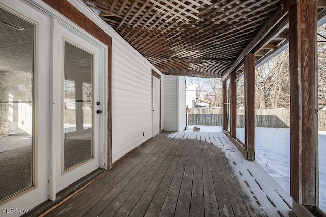 view of snow covered deck