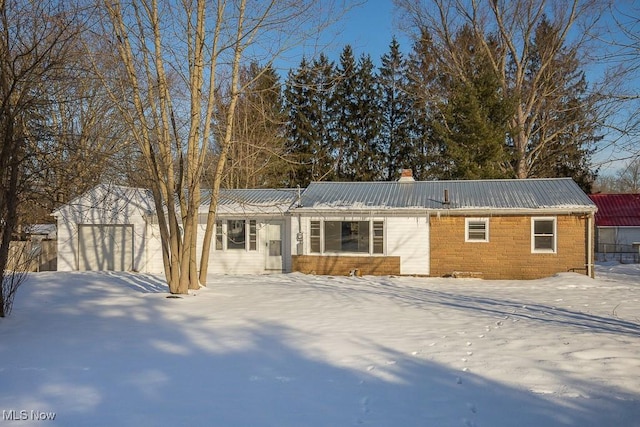 single story home with a garage