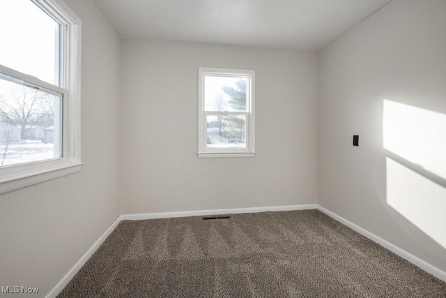 view of carpeted spare room