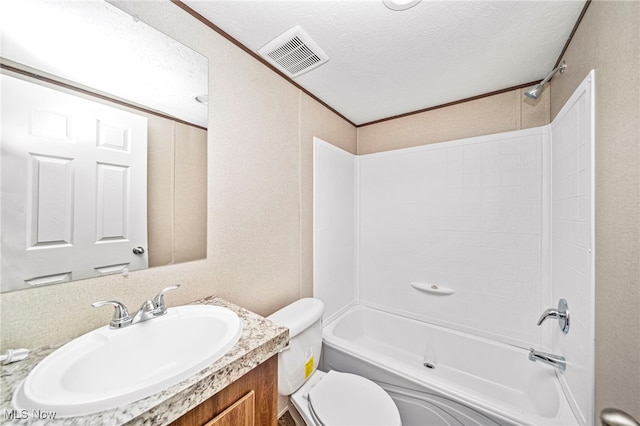 full bathroom featuring vanity, toilet, shower / bath combination, and a textured ceiling