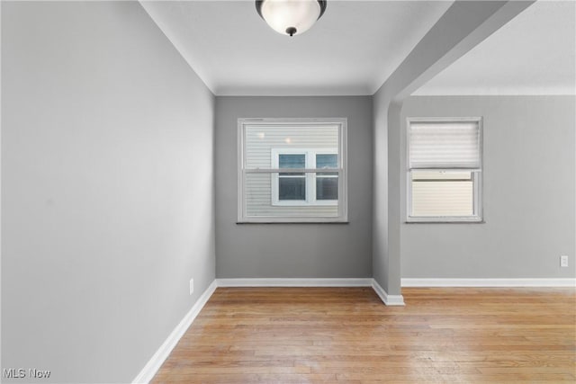 spare room with light wood-type flooring