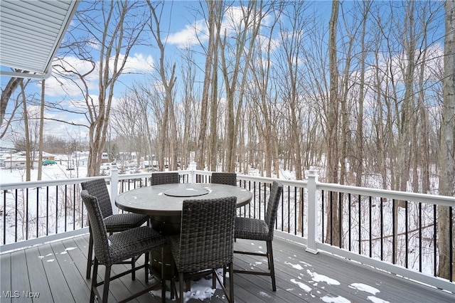 view of snow covered deck