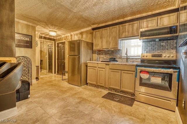 kitchen with sink, crown molding, and stainless steel appliances