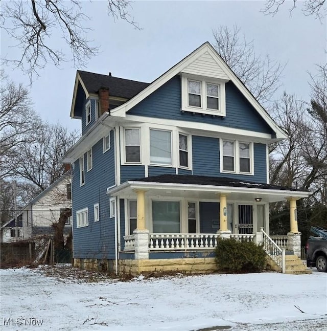 view of front of home featuring covered porch