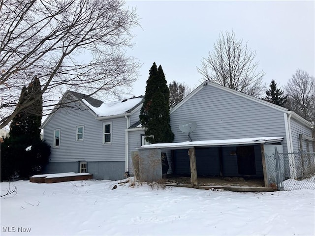 view of snow covered property