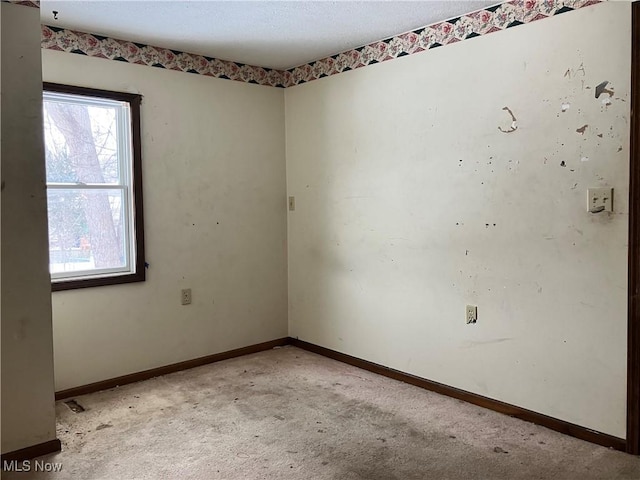 view of carpeted spare room