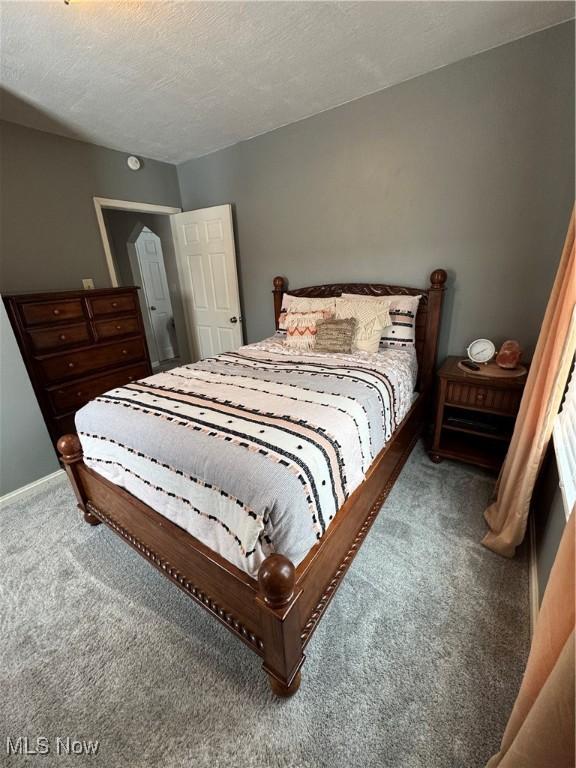 bedroom featuring carpet floors