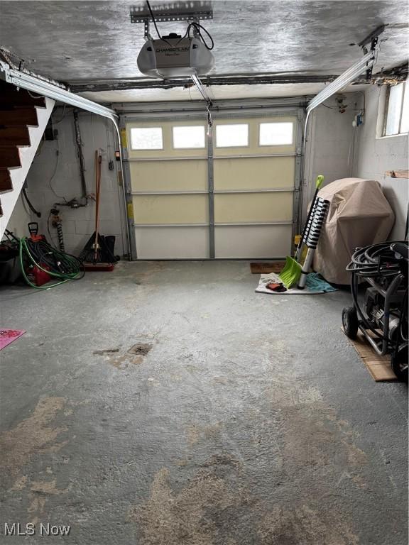 garage featuring a garage door opener