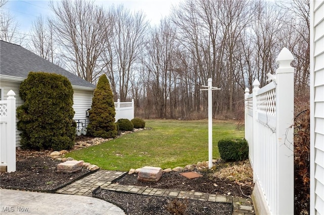 view of yard featuring fence