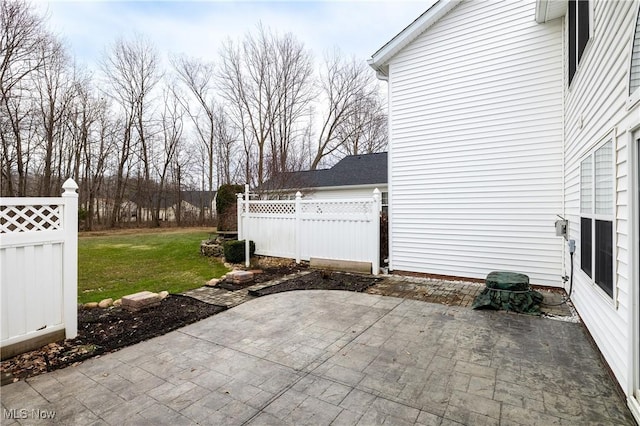 view of patio with fence