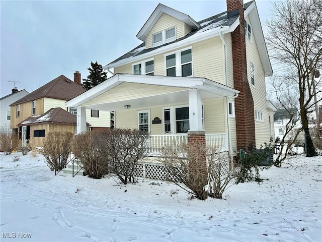 view of front of home featuring covered porch