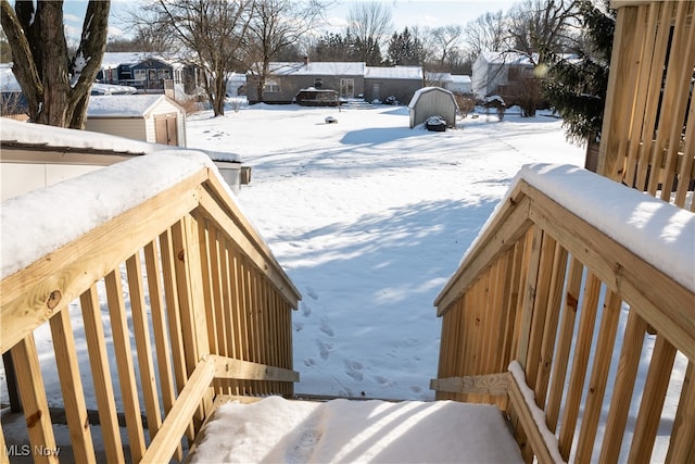 view of yard covered in snow