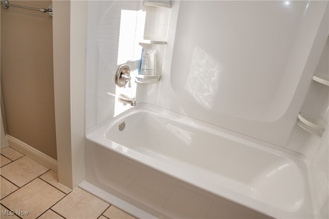 bathroom with tile patterned floors