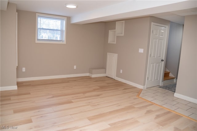 basement with light wood-type flooring