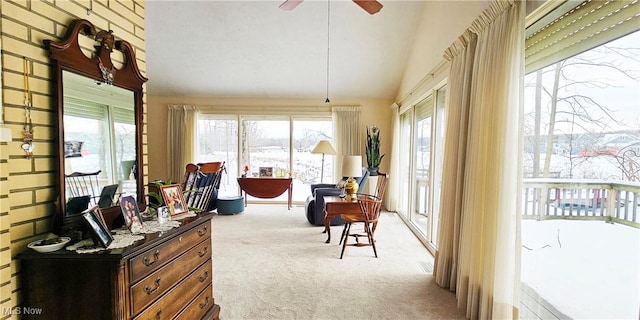 sunroom / solarium with vaulted ceiling and ceiling fan